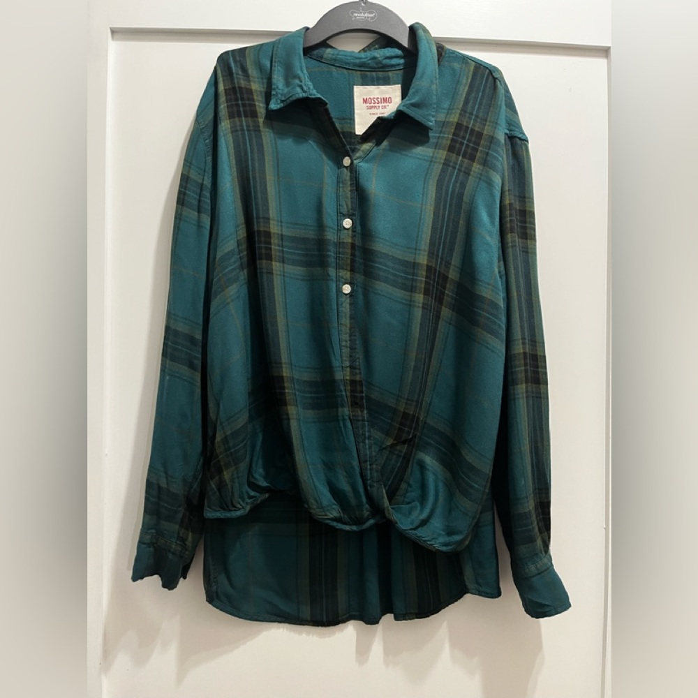 Woman’s plaid, tick front flannel shirt